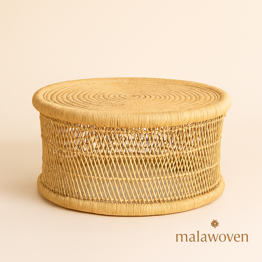 Round woven cane coffee table handcrafted by Malawian artisans – natural sustainable furniture by Malawoven
