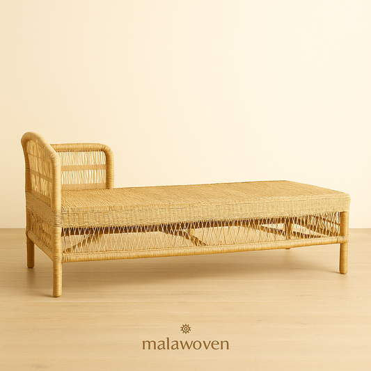 Handwoven Malawi cane daybed bench with natural finish, crafted by artisans, perfect for indoor or outdoor living spaces