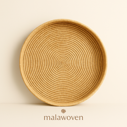 Large round handwoven decorative tray made from natural cane, artisan-crafted in Malawi.